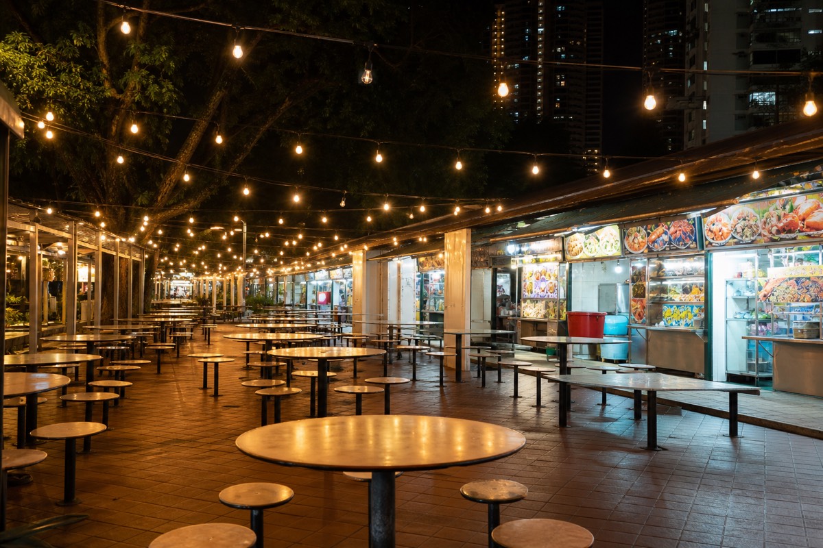 Newton Food Centre lit up in the evening